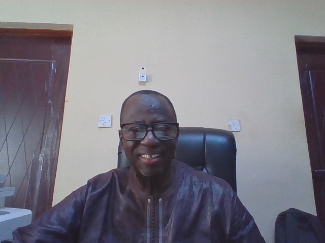 Mr. Malick Bah, Director